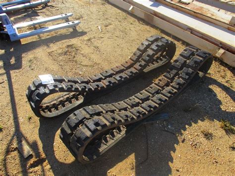 skid steer rubber track cleats|rubber track attachments.